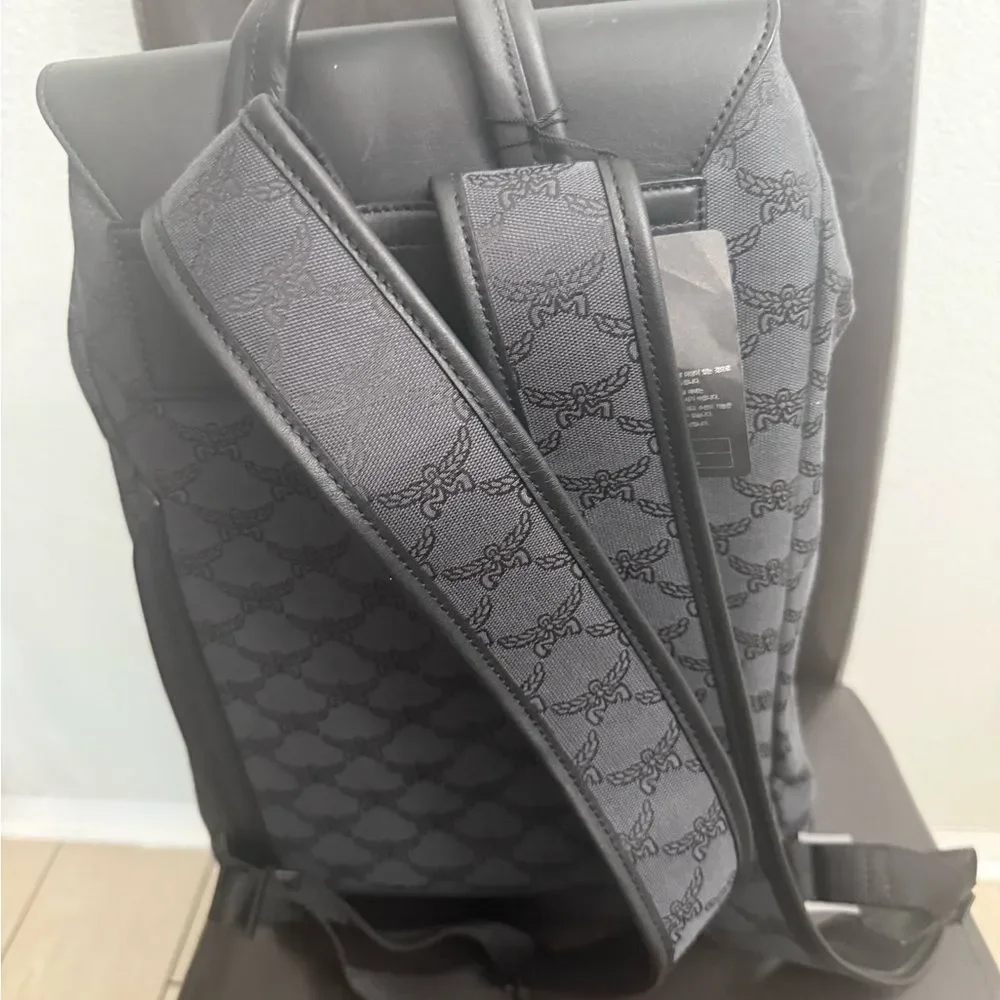 Brand new Mcm Black Backpack / travel bag / diaper bag etc fits laptop